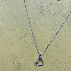 .925 Sterling silver and diamond heart necklace.